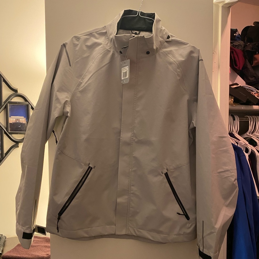 Rain jacket windbreaker in a light tan color NWT